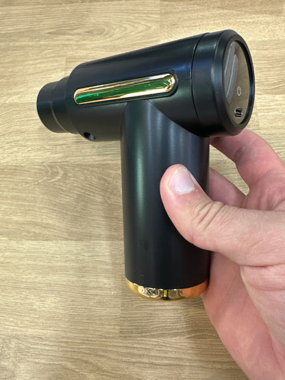 Pistola masajeador portátil