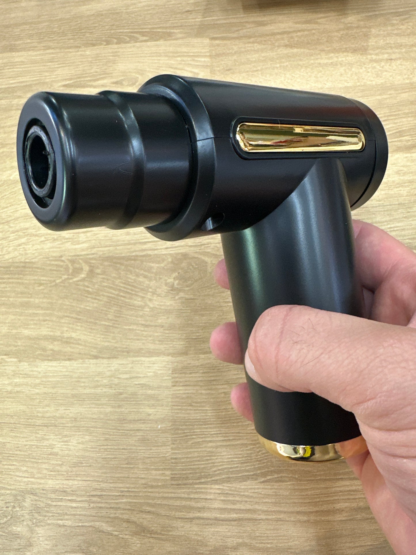 Pistola masajeador portátil